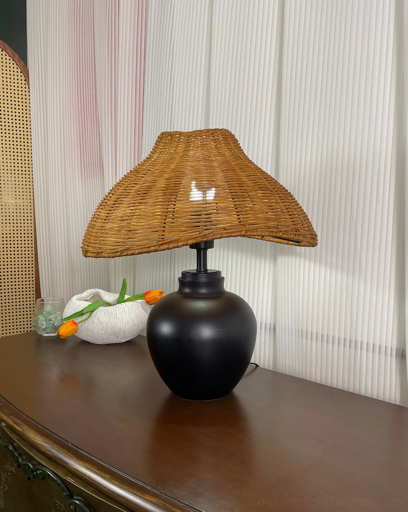 Modern table lamp with hand-woven rattan shade for reading or accent lighting in home office