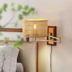 Adjustable rattan wall lamp mounted beside bedroom headboard for task lighting and ambiance