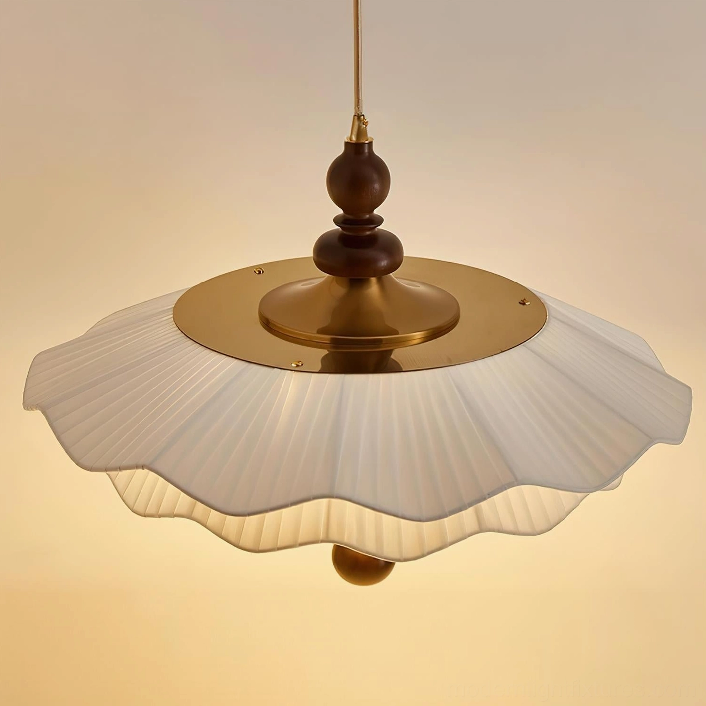 Ravina pleated pendant lamp warm white integrated LED lighting creating intimate dining ambiance