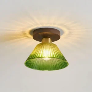 Overhead view of Rayelle modern ceiling light fixture showing ribbed glass texture and warm ambient light projection