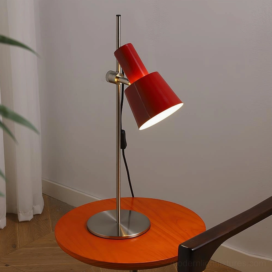 Contemporary dark red adjustable desk lamp with illuminated shade on wooden side table