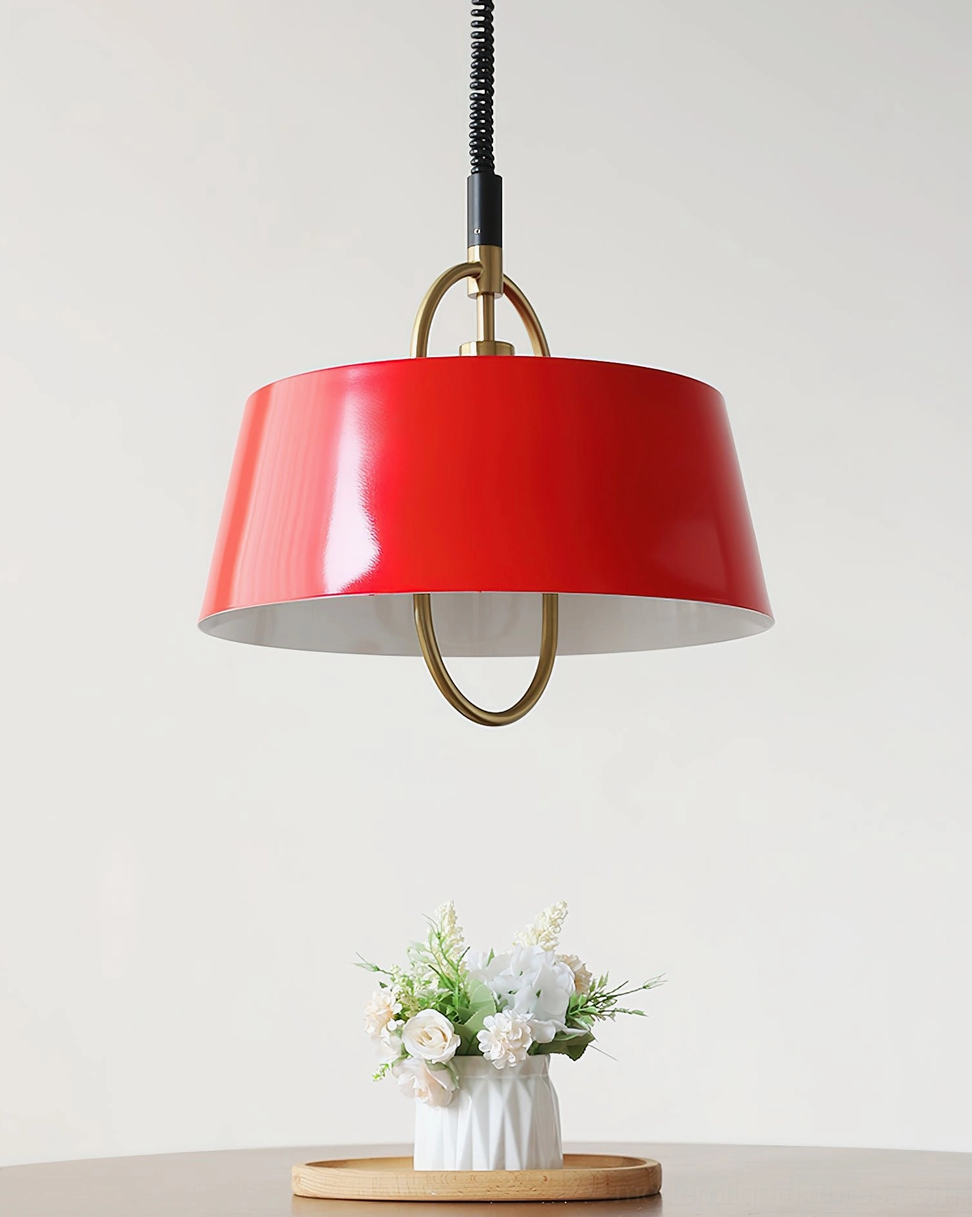 Red Angelo modern pendant light with glossy finish and polished brass ring hardware detail