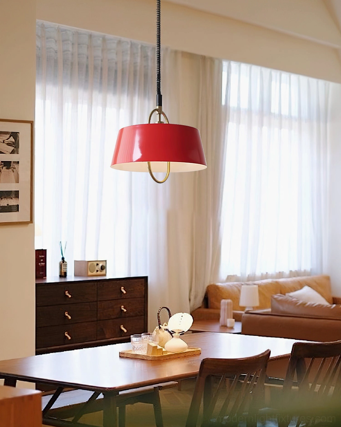 Angelo modern pendant light in red installed in contemporary dining and living space with warm home décor