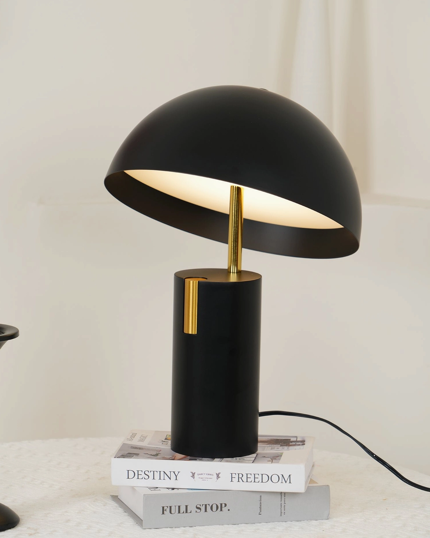 Red Avo LED table lamp with integrated brass accent, bold contemporary design statement piece