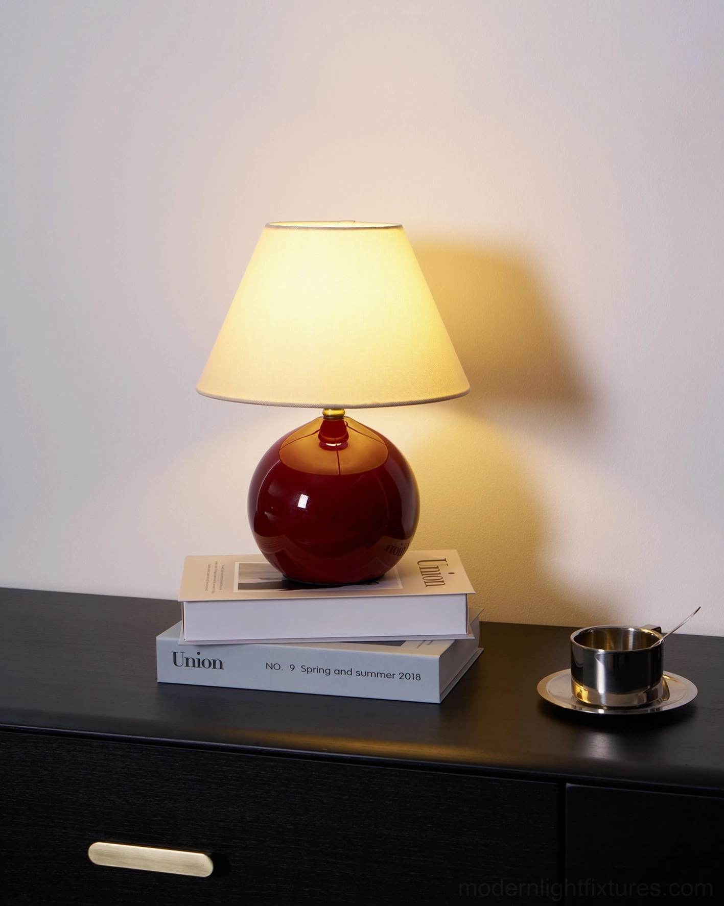 Red sphere glass table lamp with beige fabric shade minimalist design contemporary lighting