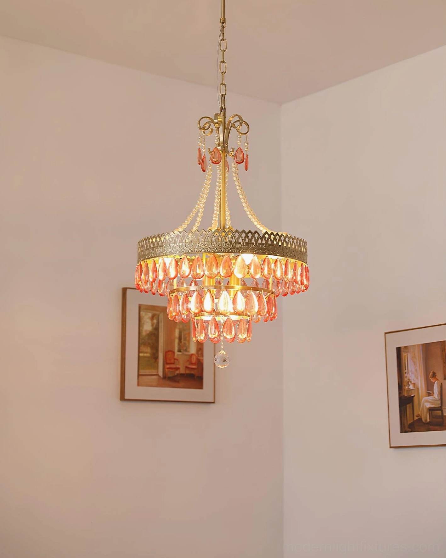 Red ruby crystal chandelier dining room centerpiece table lighting warm atmosphere entertaining