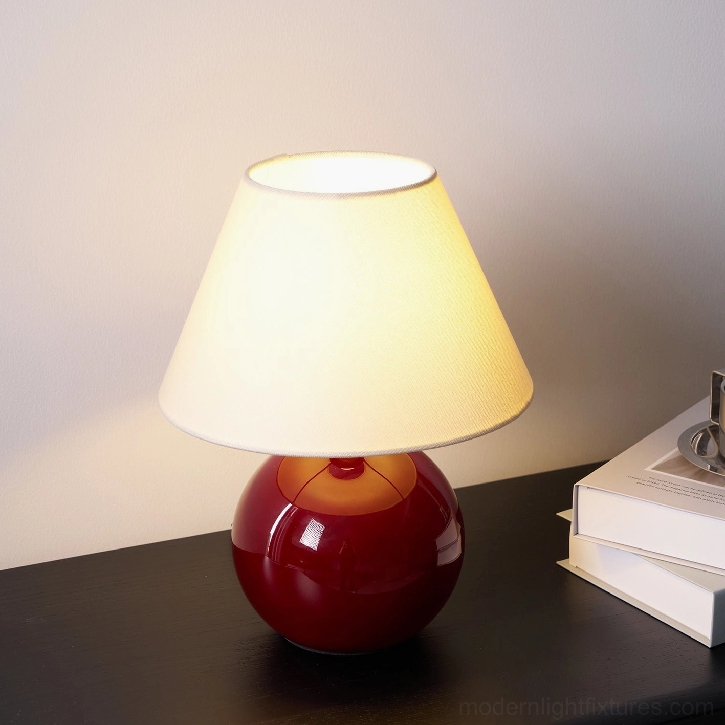 Red spherical table lamp minimalist form contemporary bedroom living room lighting