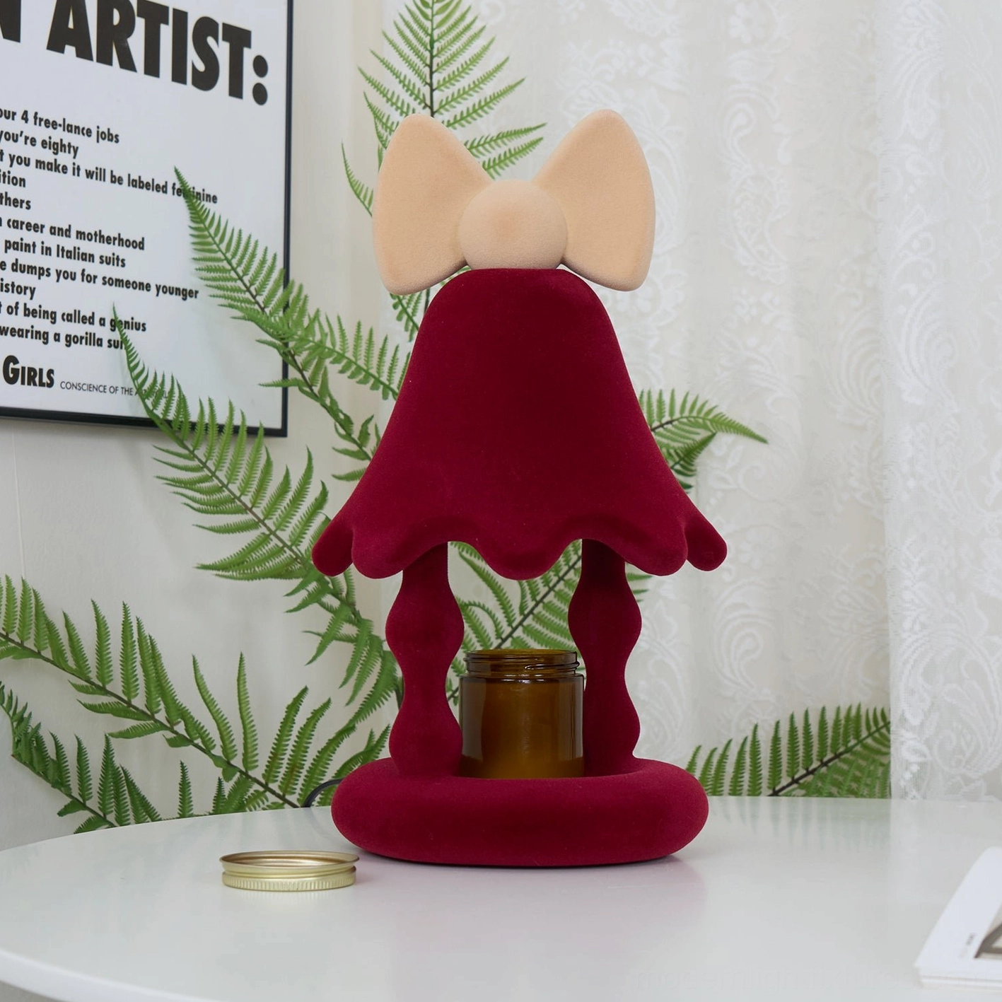 Red Stacy candle warmer table lamp displayed on bathroom counter as spa-like home décor focal point with ambient glow
