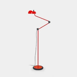 Red articulated swing arm floor lamp with dual joints, matte finish, and round weighted base shown in studio frontal view