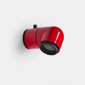 Tubular adjustable wall sconce with glossy red finish, close-up front view showing cylindrical spotlight design