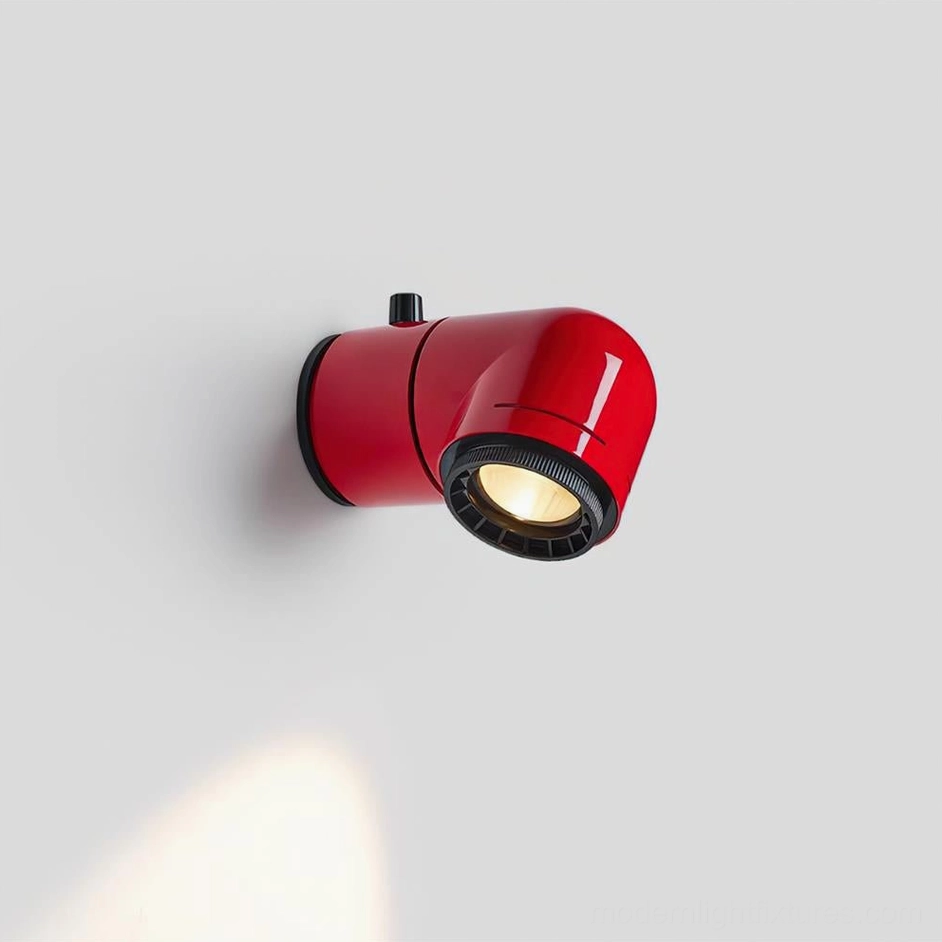 Red tubular wall sconce with glossy finish and warm white LED light beam illuminated