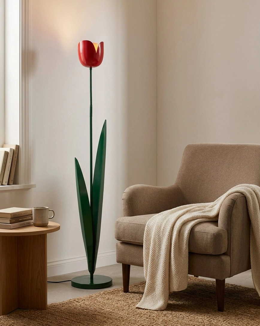 Red tulip floor lamp base and stem detail showing painted iron finish and weighted round base – botanical floor light construction quality