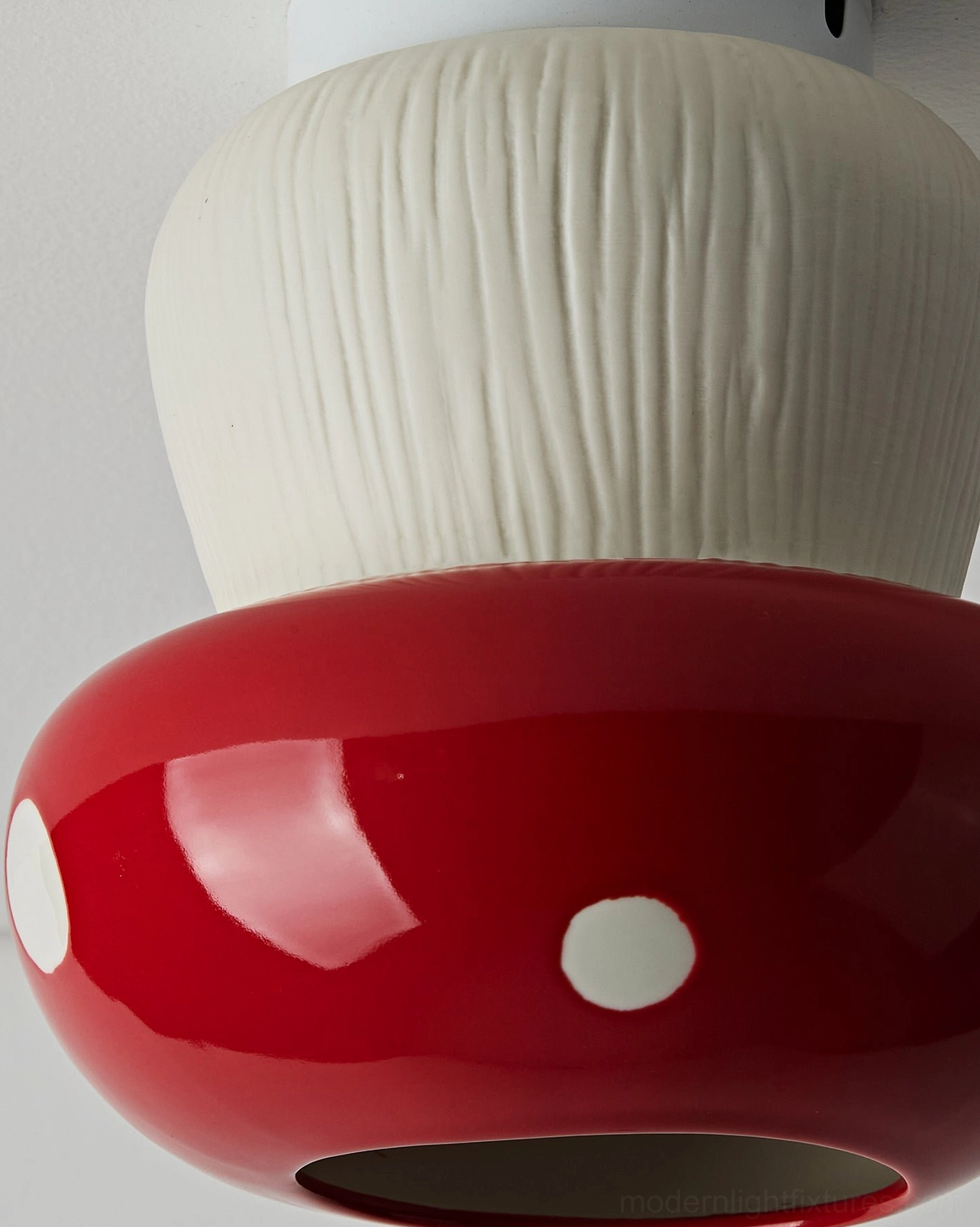 Mushroom ceiling light fixture front product view showing red and white ceramic design elements