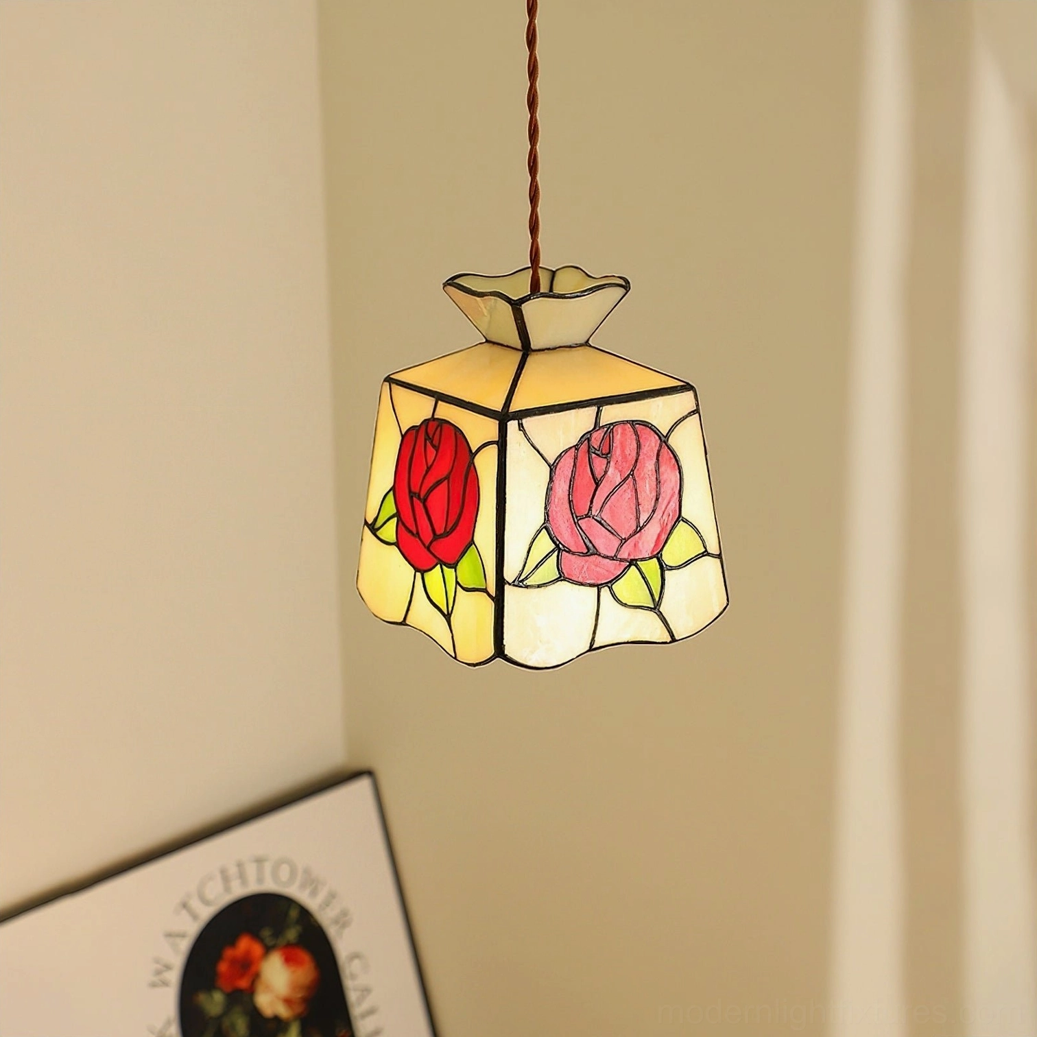 Pink and red rose stained glass pendant light in modern interior corner setting