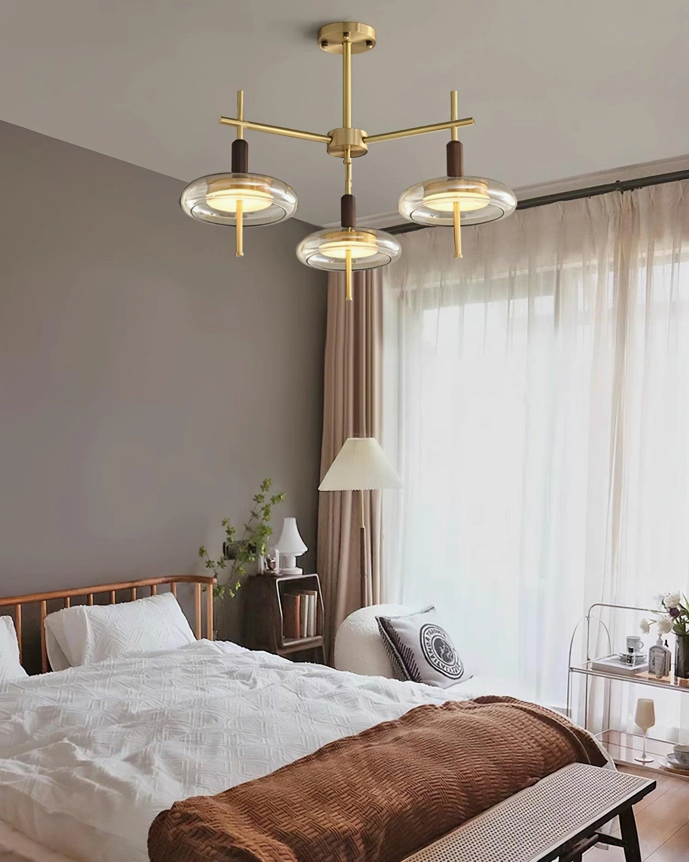 Redondo 4-head branch chandelier in modern warm bedroom with minimalist nordic brass design
