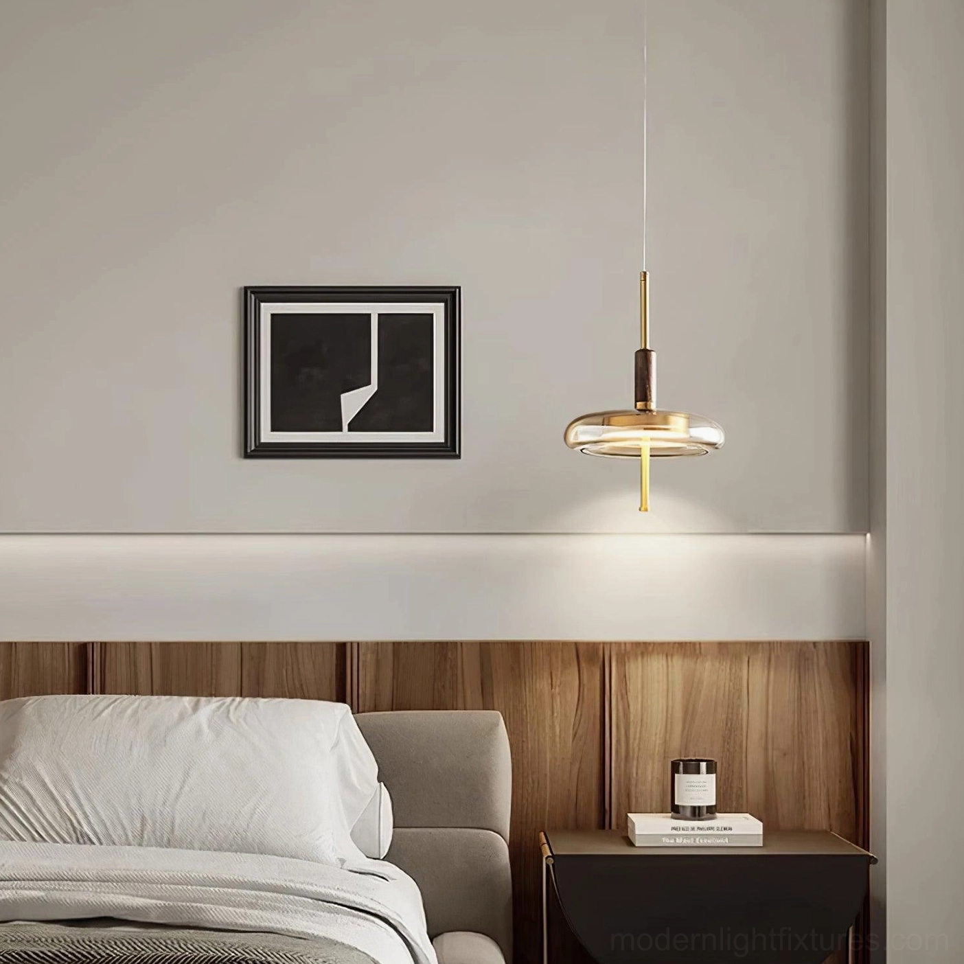 Single Redondo amber pendant fixture in modern bedroom bedside lighting setup, creating spa-like ambiance