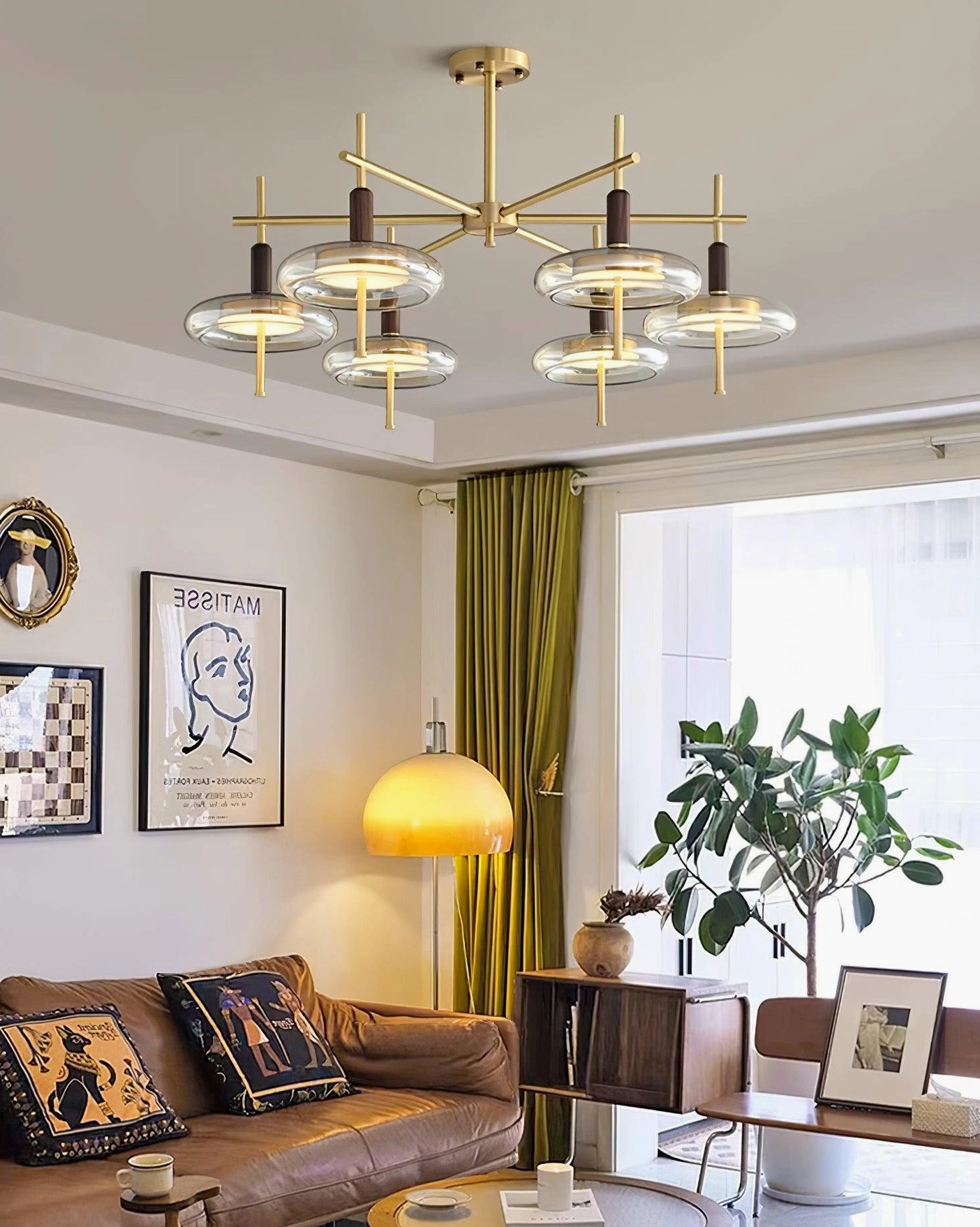 Redondo branch chandelier 8-head model in bright modern living room with green curtains brass frame