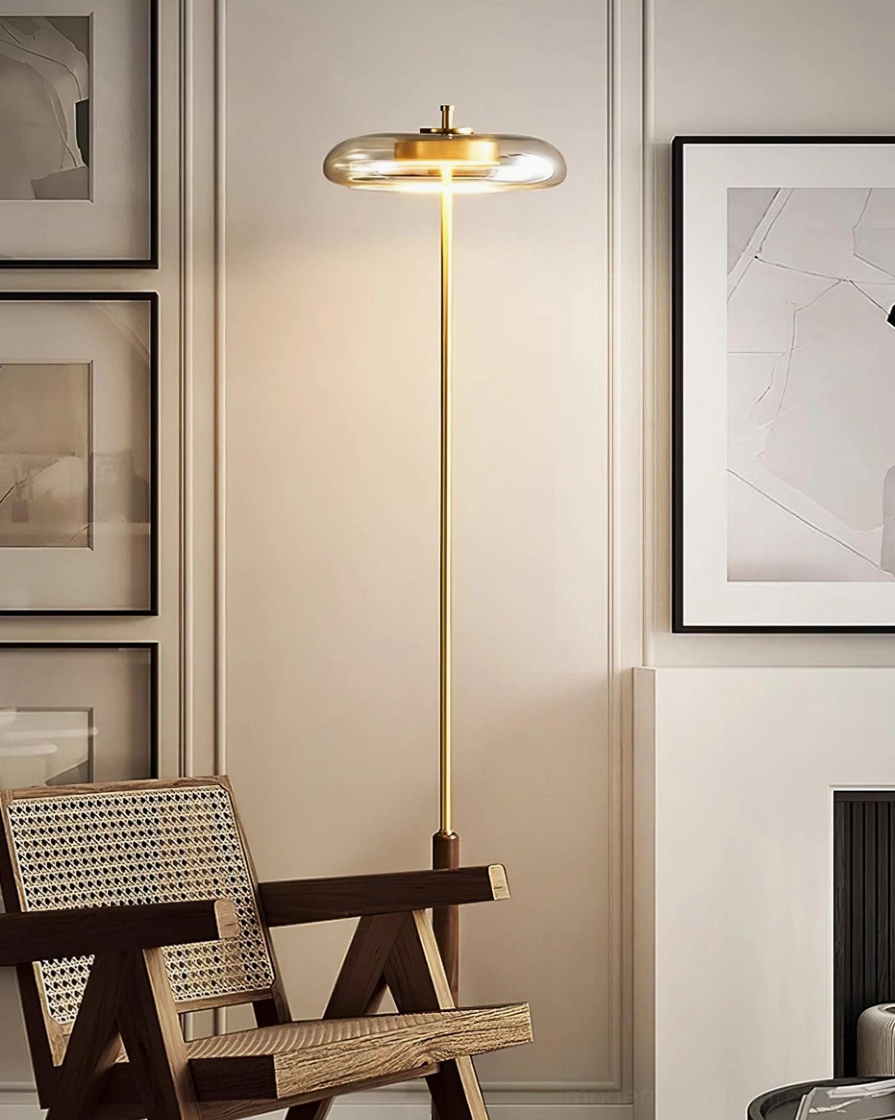 Redondo geometric floor lamp with brass base and disc shade in art gallery style minimalist interior design space