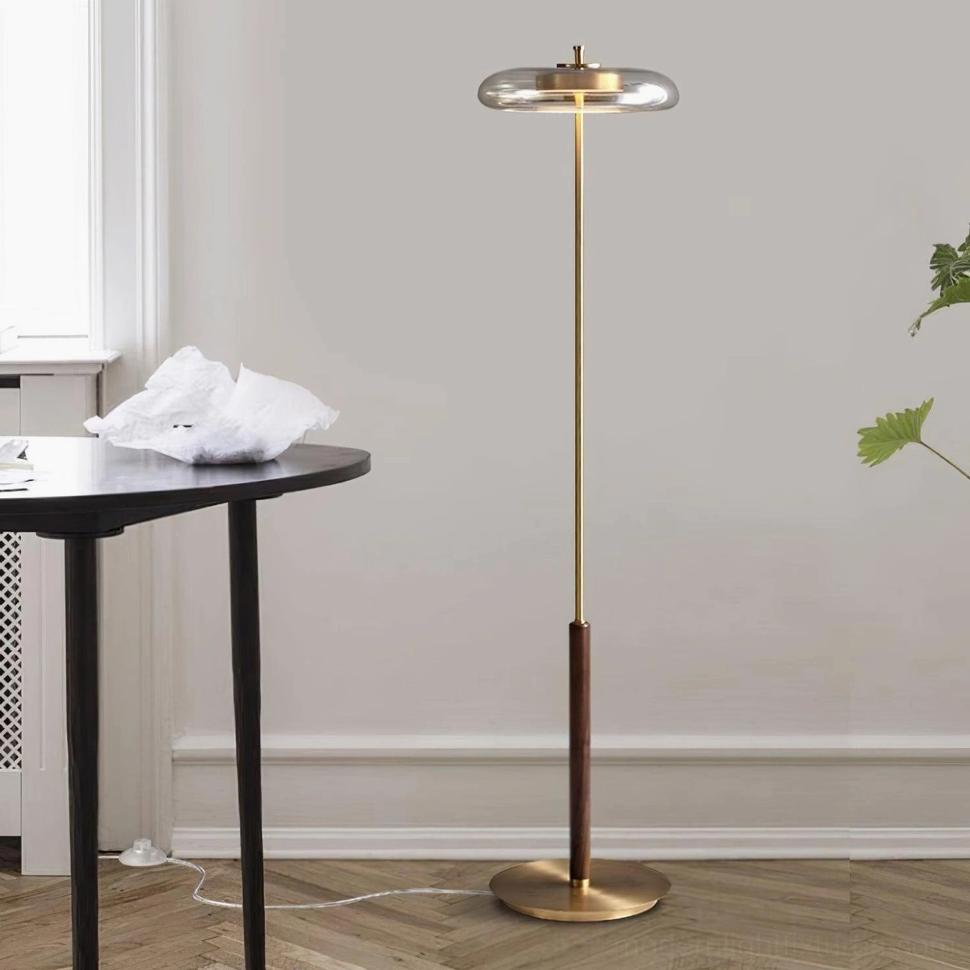 Redondo contemporary floor lamp with brass rod and walnut wood accent in empty minimalist scandinavian style interior room