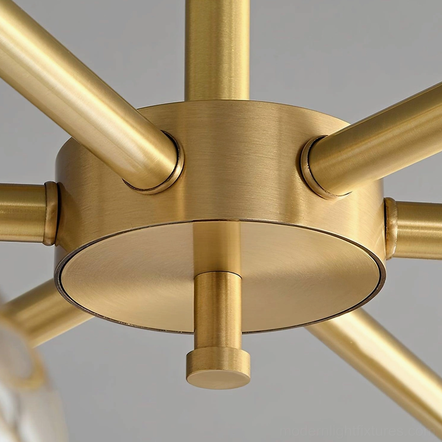 Redondo chandelier detail view of glass shade and brass socket construction and finish