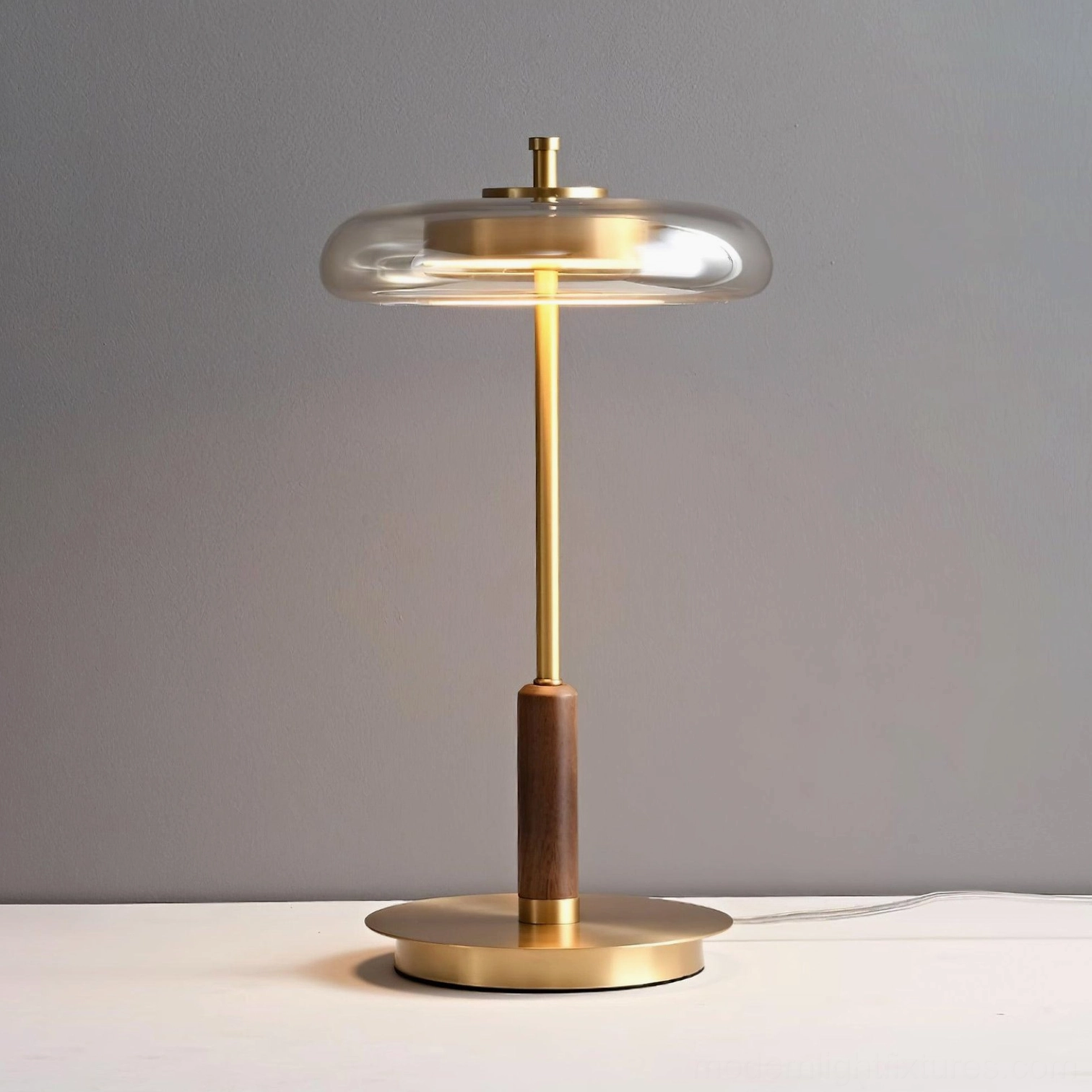 Redondo table lamp side profile showing brass base and walnut column detail