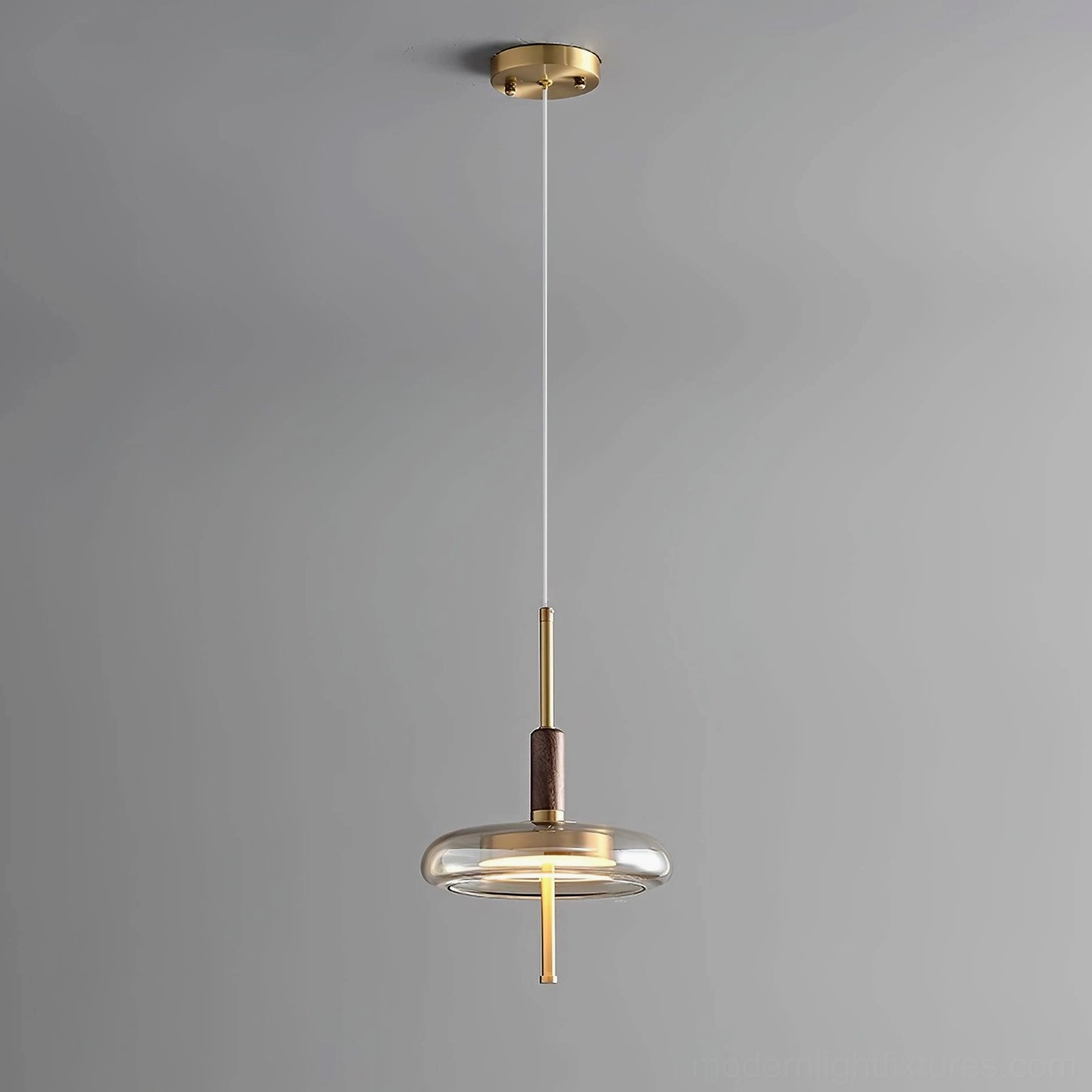 Redondo pendant ceiling fixture installed in luxury contemporary interior, demonstrating design versatility