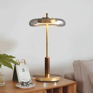 Redondo modern table lamp on living room side table with warm ambient lighting and decor