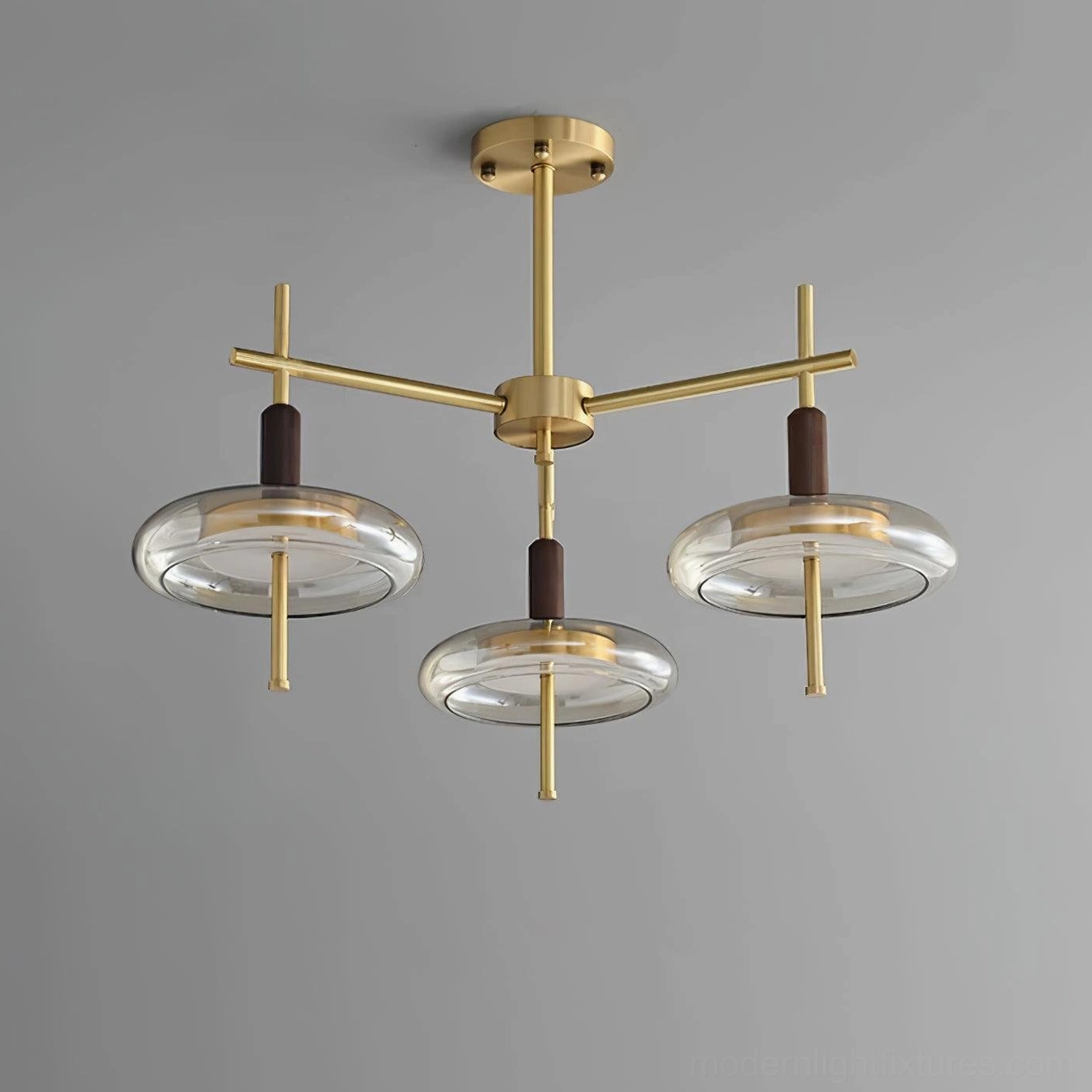Redondo multi-head chandelier showing warm brass tone and clear glass disc shades design