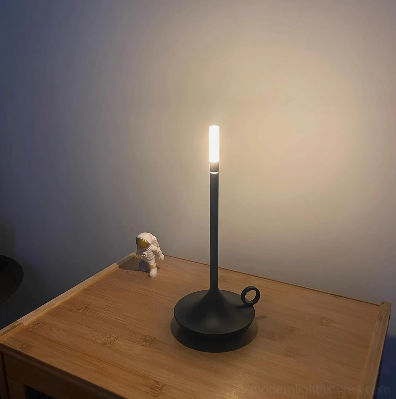 Contemporary LED candle table lamp with refined cylindrical form ideal for modern interior design