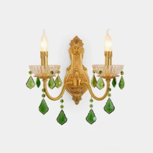 Emerald green crystal brass wall sconce with dual candles, front overhead studio view