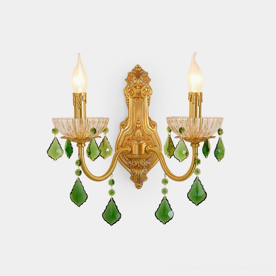 Emerald green crystal brass wall sconce with dual candles, front overhead studio view