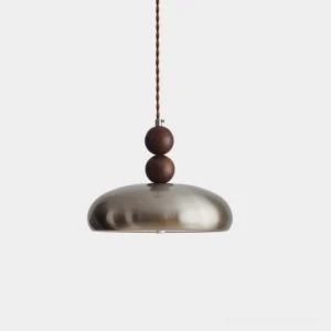 Rellin mid-century pendant light with brushed nickel shade and dark walnut wooden bead stack, front studio view