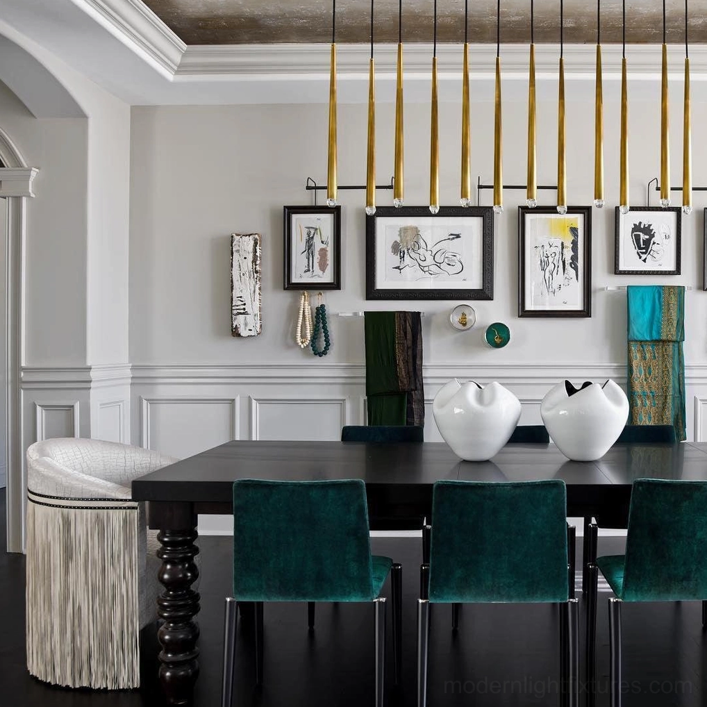 Renaie Brass Chandelier above formal upscale dining table with velvet chairs and dark wood