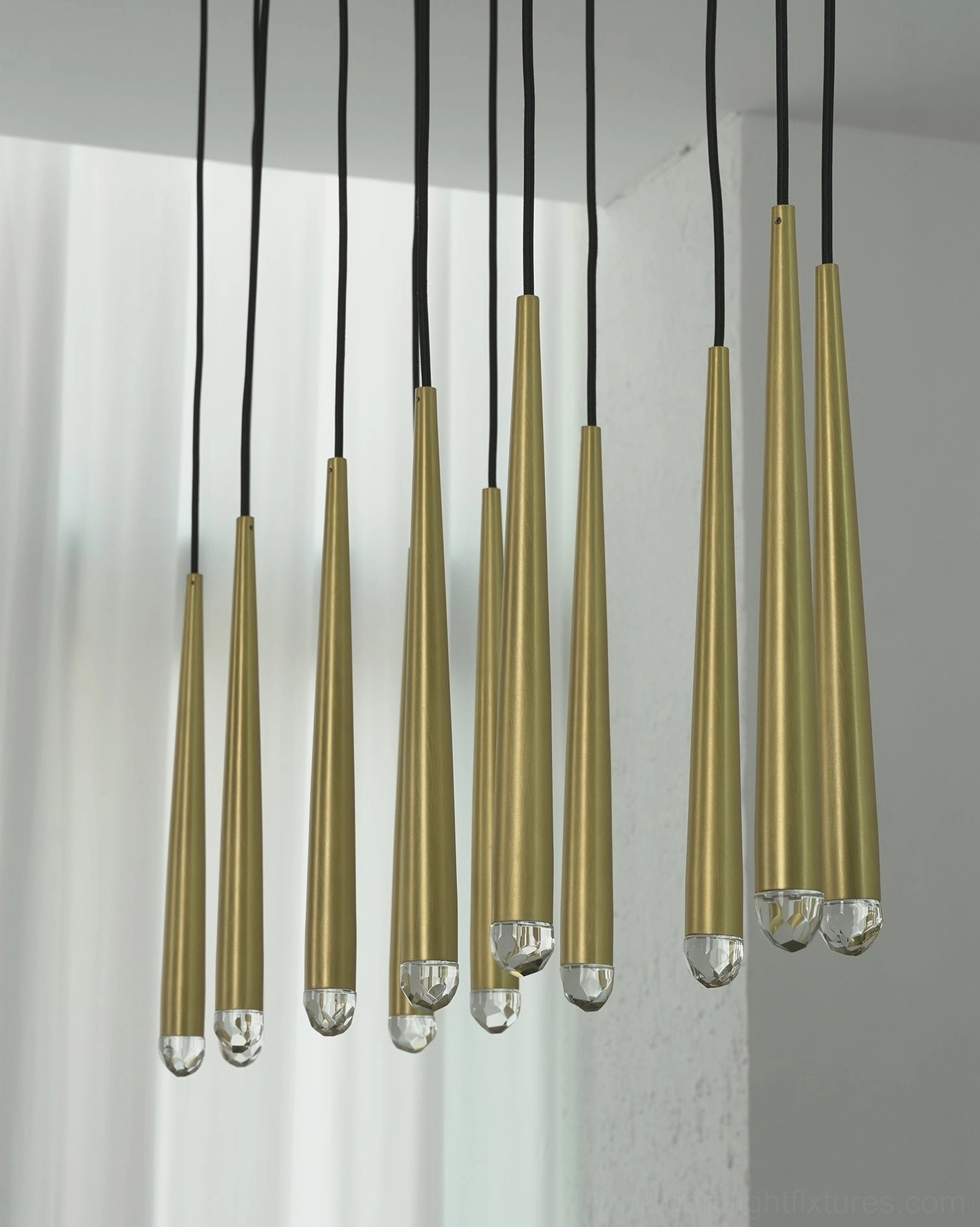 Renaie Brass Cluster Chandelier installed modern dining room pendant arrangement