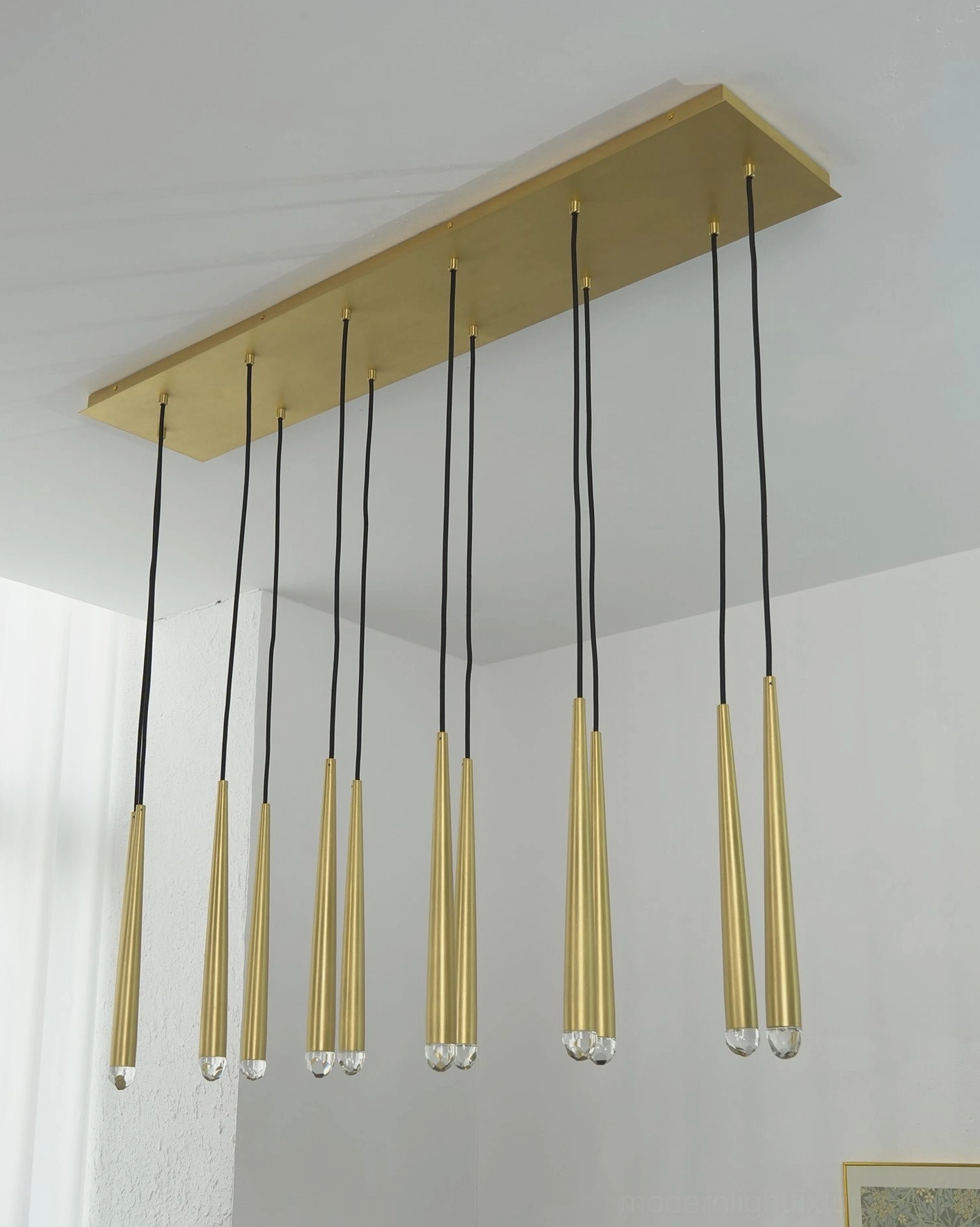 Renaie Brass Chandelier tapered rod suspension system minimalist design detail