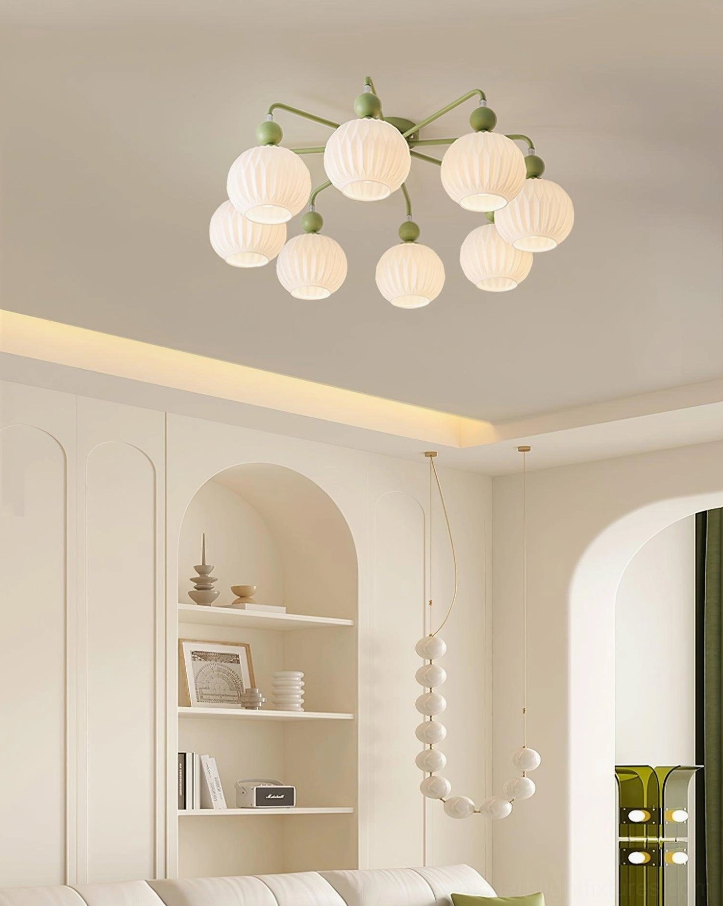 8-head Renee semi-flush chandelier in French cream living room with elegant pastoral design and green metal accents - modern light fixture