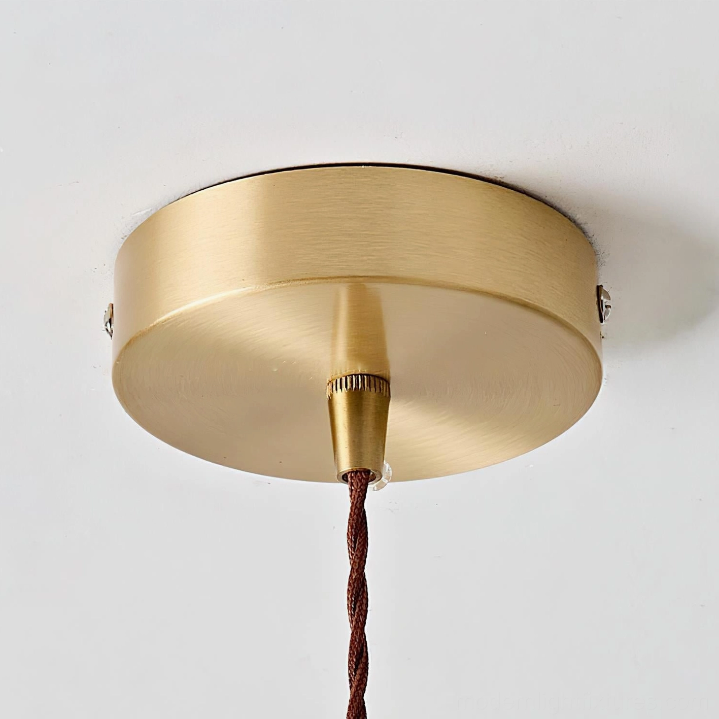 Textured resin pendant light installed in contemporary interior setting, ambient lighting showcase