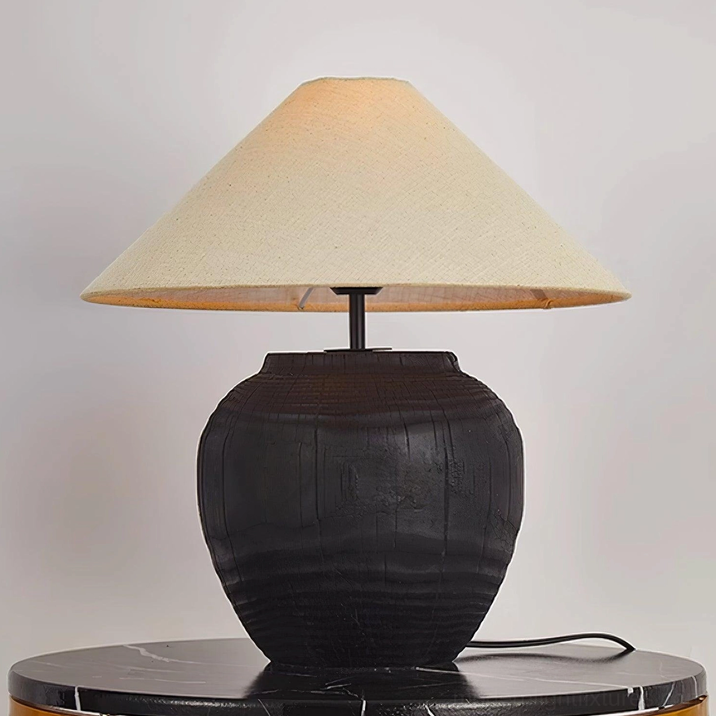 Black textured resin table lamp base and construction detail