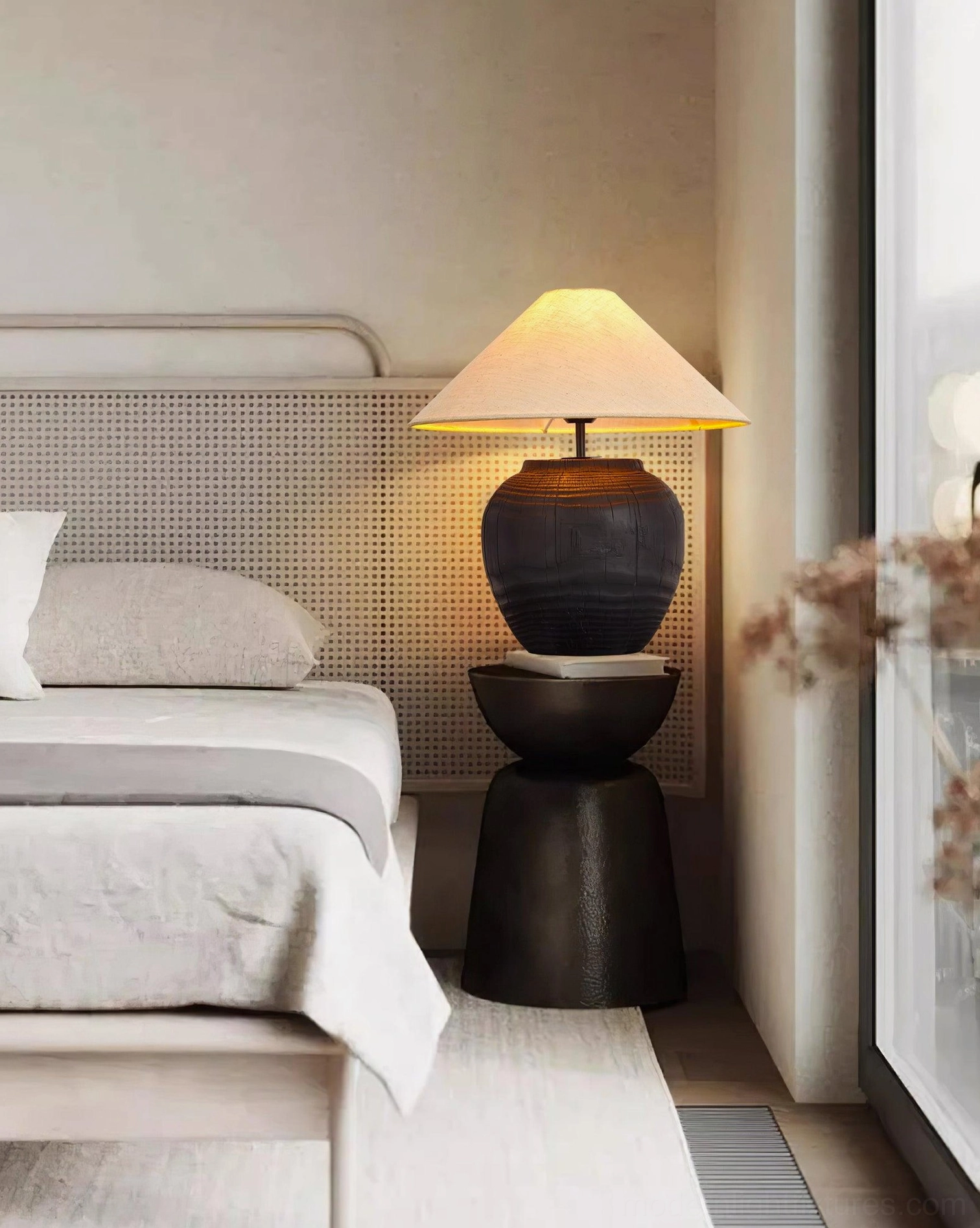 Textured resin table lamp side profile view with fabric shade