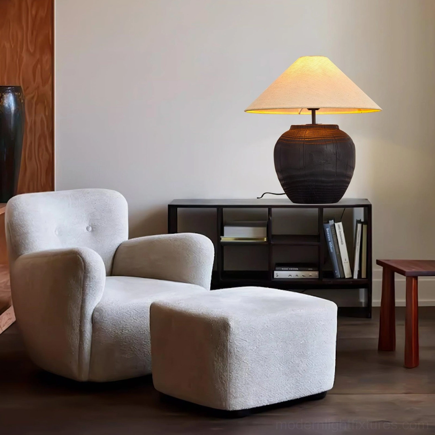 Textured resin table lamp with warm light diffusion through fabric shade