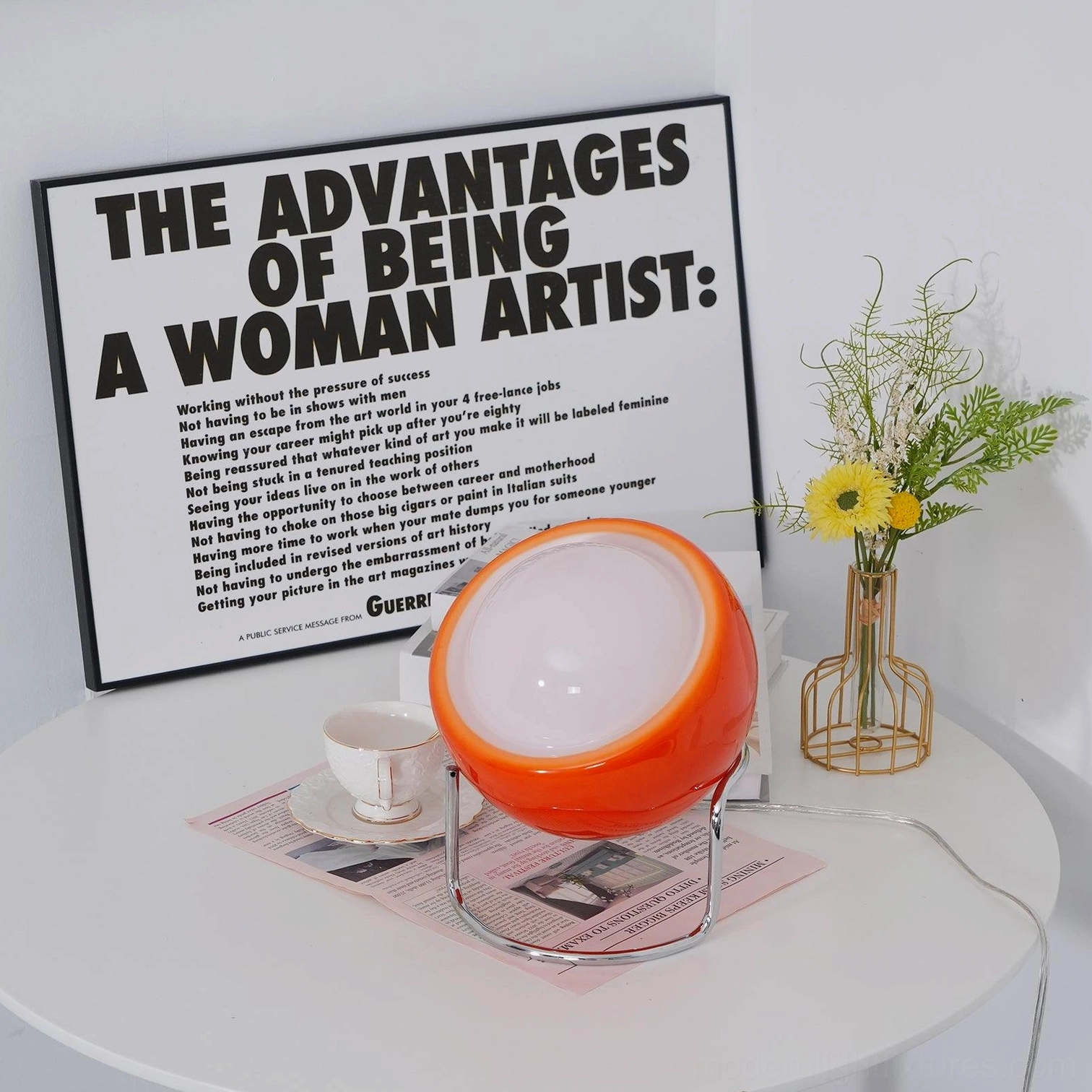 Retro dome table lamp with tilted illuminated sphere creating warm ambient glow, cozy lighting