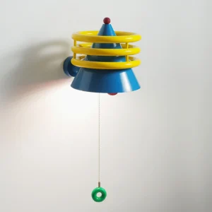 Kinetica retro-futuristic wall lamp side angle with green pull-chain switch illuminated