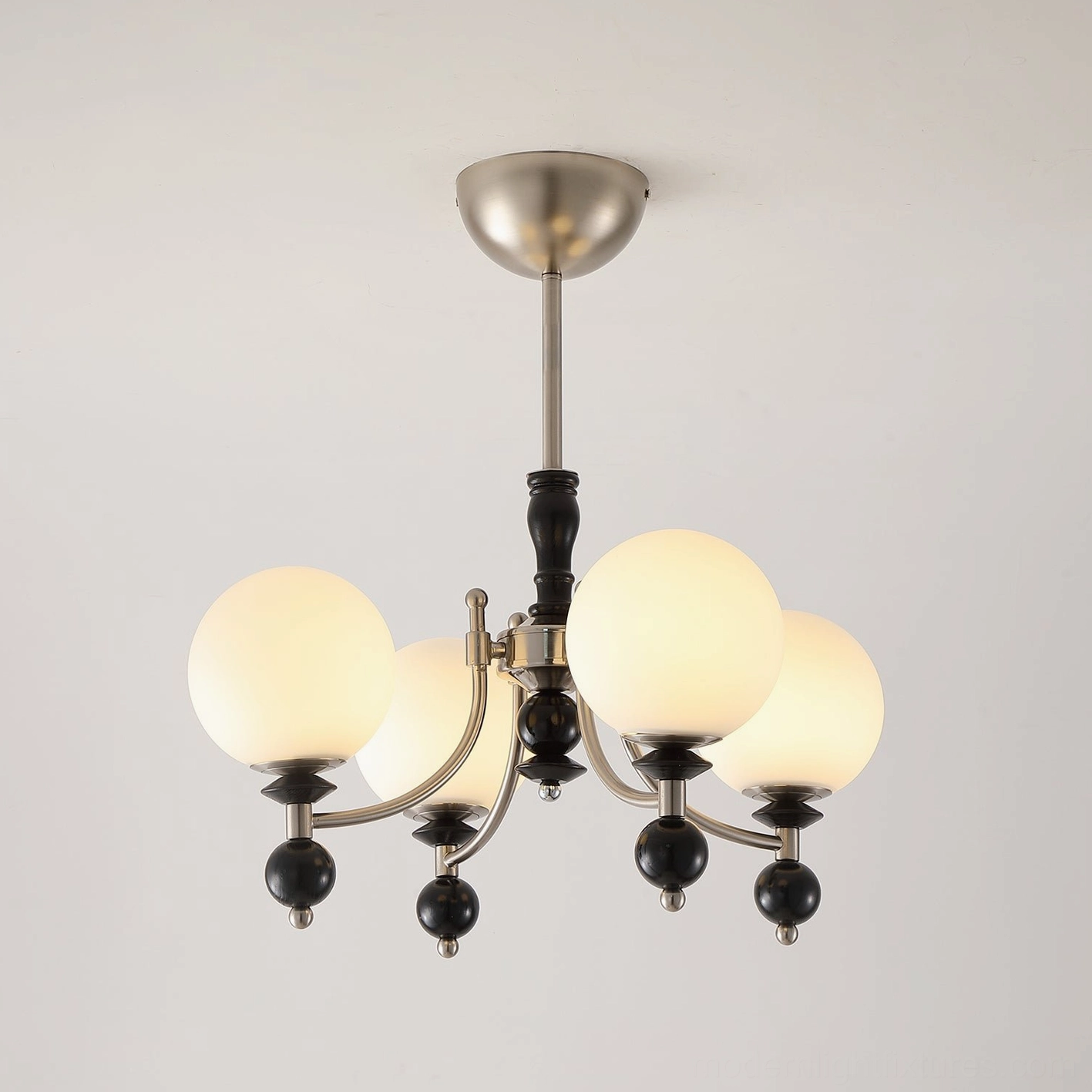 Retro globe chandelier installed in contemporary home showing ambient lighting and frosted glass diffusion effect