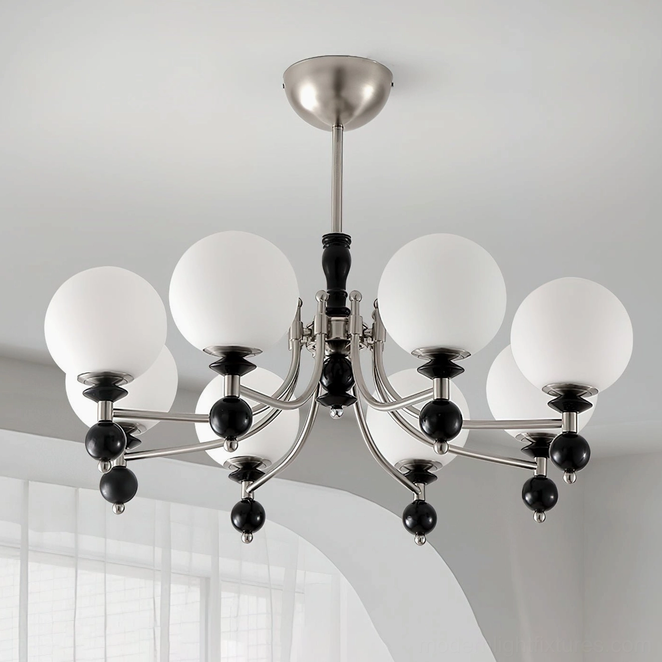 Retro globe chandelier close-up detail showing frosted white glass shades and metal frame construction