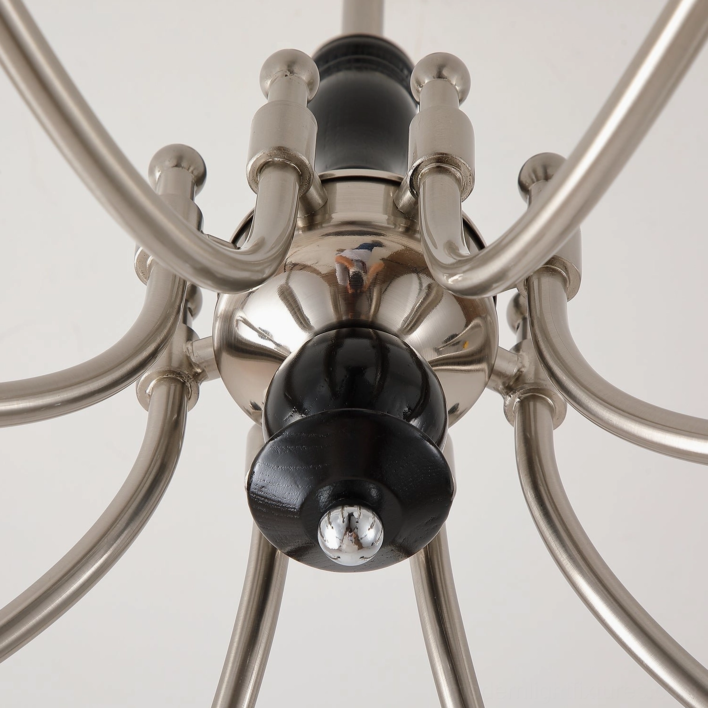 Retro globe chandelier in contemporary living space displaying vintage aesthetic with modern functionality