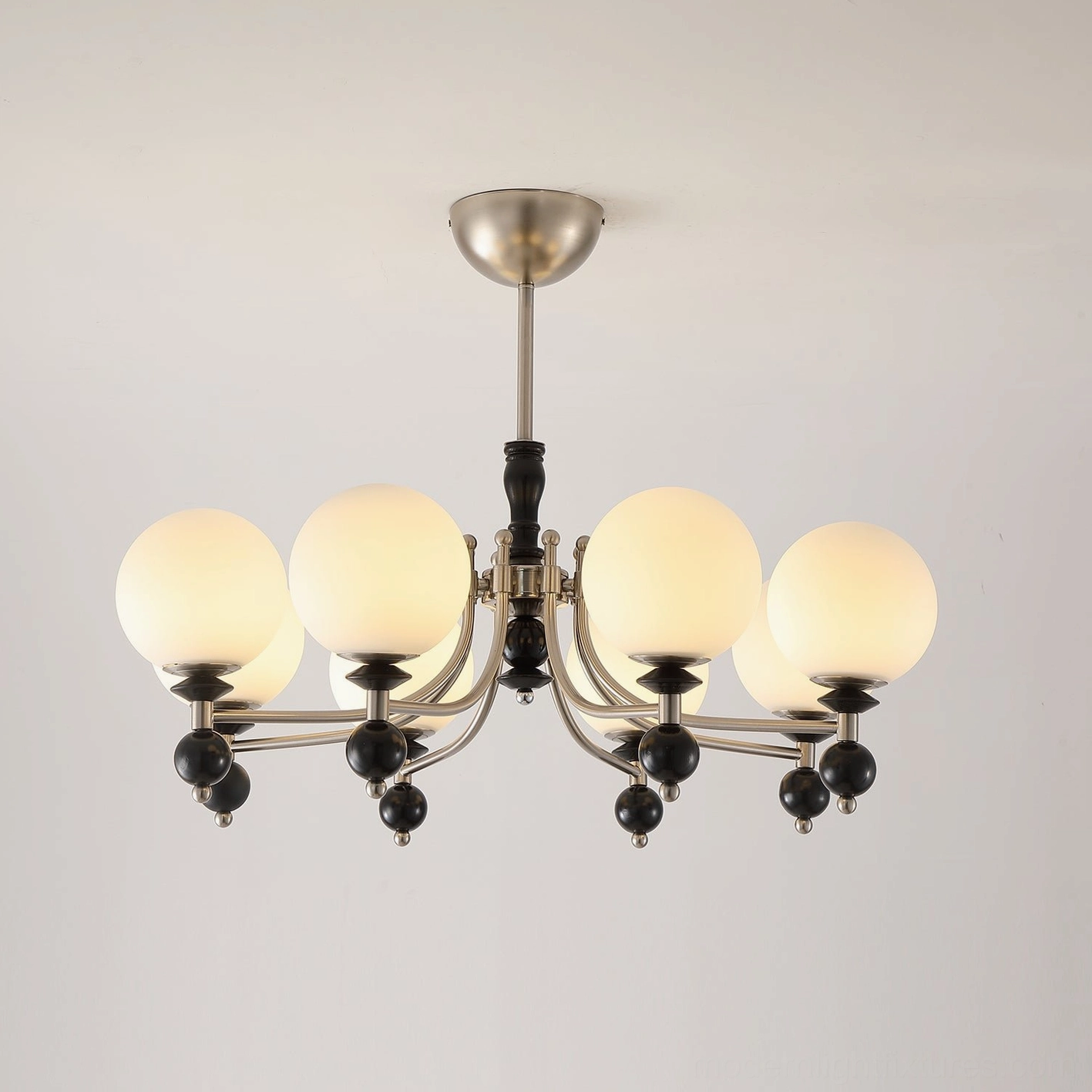 Retro globe chandelier detail showing metal decorative pendant balls and polished nickel canopy construction
