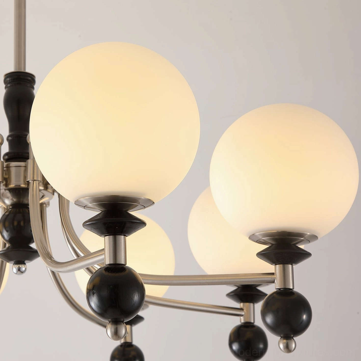 Retro globe chandelier overhead installation view showing geometric arrangement of frosted glass globes
