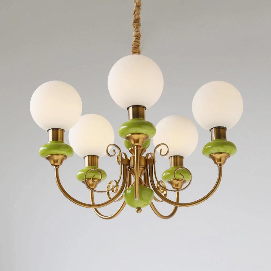 Retro modern glass chandelier with spherical milky white shades, mid-century design aesthetic