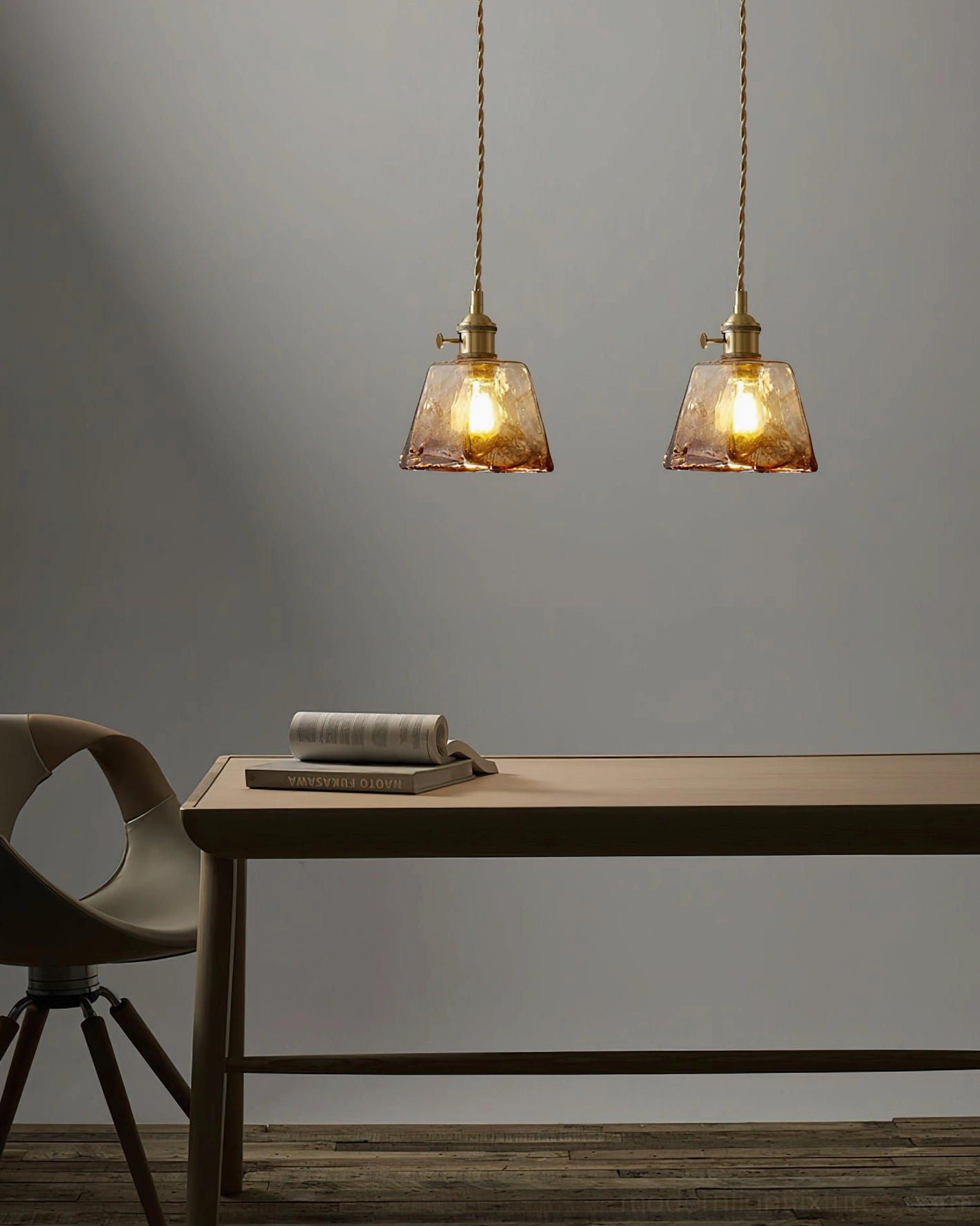 Retro pendant light with rippled amber glass shade and brass hardware detail