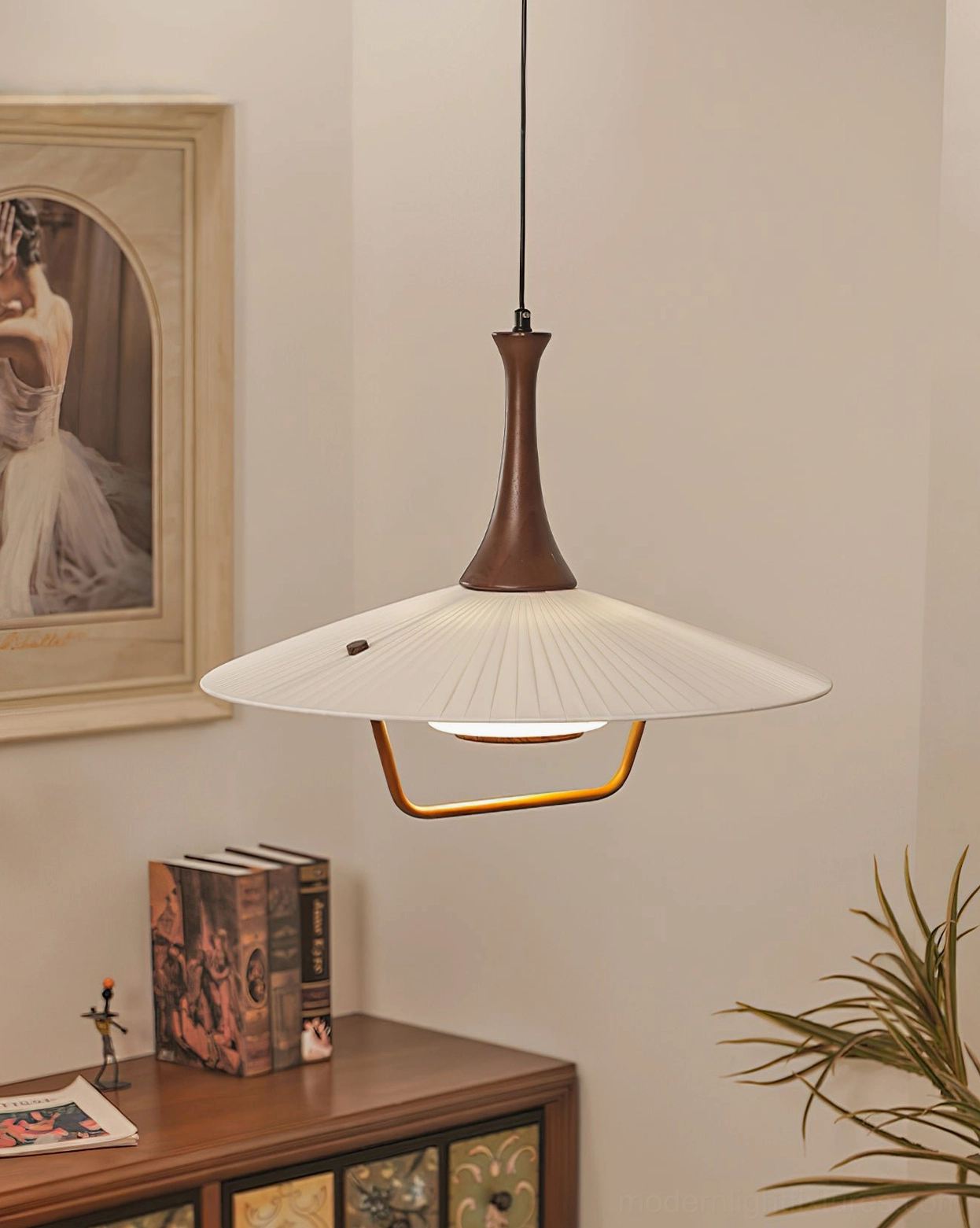 Retro pleated pendant light side view in residential dining room with wooden console table and décor